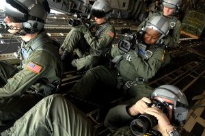 SrA Chalanda Roberts from the 1st Combat Camera squadron, Charleston, SC., photograph C-17 Globemaster III's from the 437th and 315th Airlift Wing, Charleston AFB, SC., flying in formation over Charleston S.C., on December 18th, 2008 during a strategic brigade airdrop (SBA) exercise involving a 13 multi-ship formation on Dec. 18, 2008. C-17 Globemaster III transporters must be able to meet the Army's goal of airdropping a brigade's worth of troops and equipment (approx. 3,250 soldiers and 3,450 tons of equipment). This multi-ship training demonstrates the outstanding teamwork of active duty Airmen, Reservists and civilians to be mission ready when the nation needs this critical capability. Charleston AFB's aircraft currently accounts for half of the Air Force SBA requirement. (US Air Force photo by Tech. Sgt. Jeremy Lock) (RELEASED)